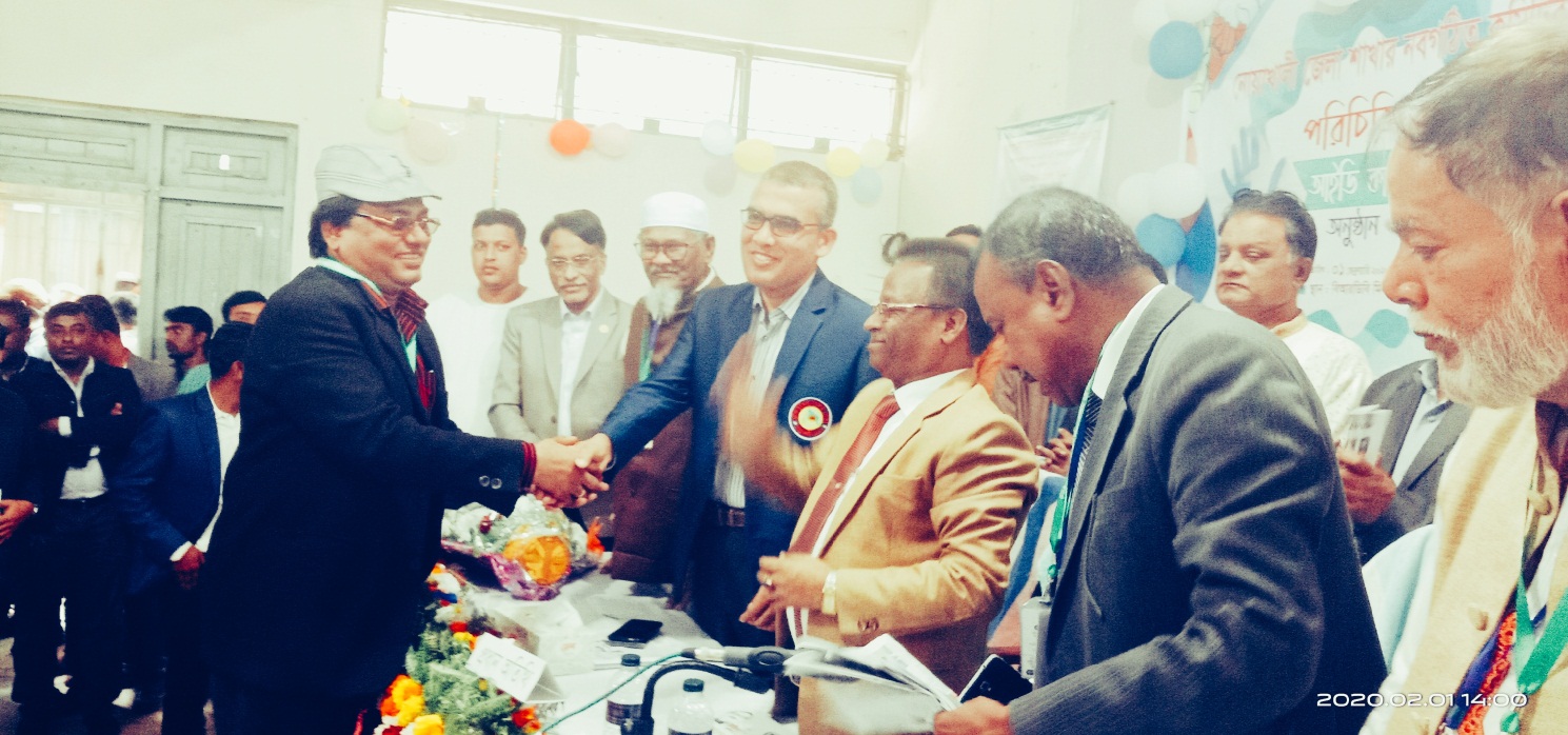 Gias Uddin Mithu has been elected the Noakhali District Education Secretary for Human Rights Council, Council Chairman Farid Uddin is wearing the card. Begumganj-3 constituency Mamunur Rashid Kiran and district police superintendent Alamgir Hossain were present.