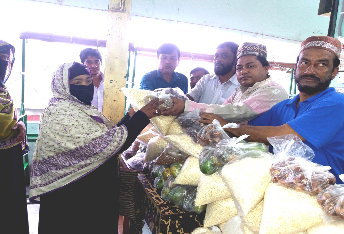 Chairman of Begumganj-Sonaimuri Education and Health Development Foundation Md. Gias Uddin Mithu is distributing Iftar items on the occasion of the holy month of Ramadan.