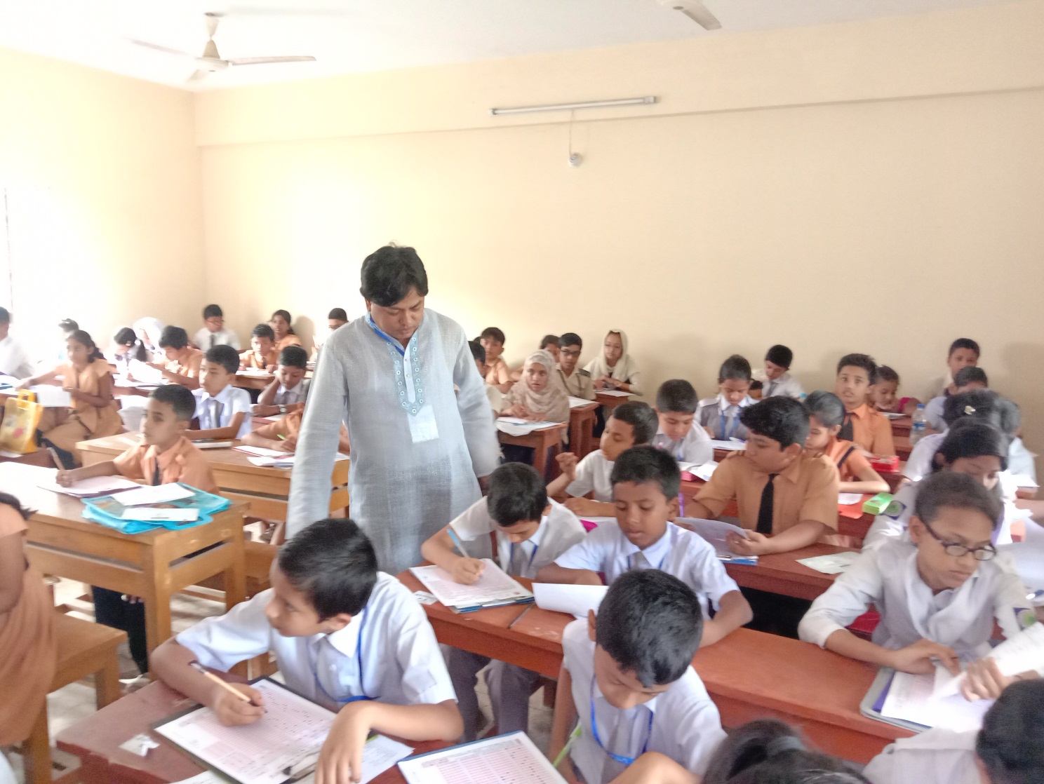 In the picture- Chairman of by the Technical Education Board and Begumganj Technical and Computer Institute Principal Gias Uddin Mithu is seen as an observer at Maijdee Public School and College on TSP scholarship examination.