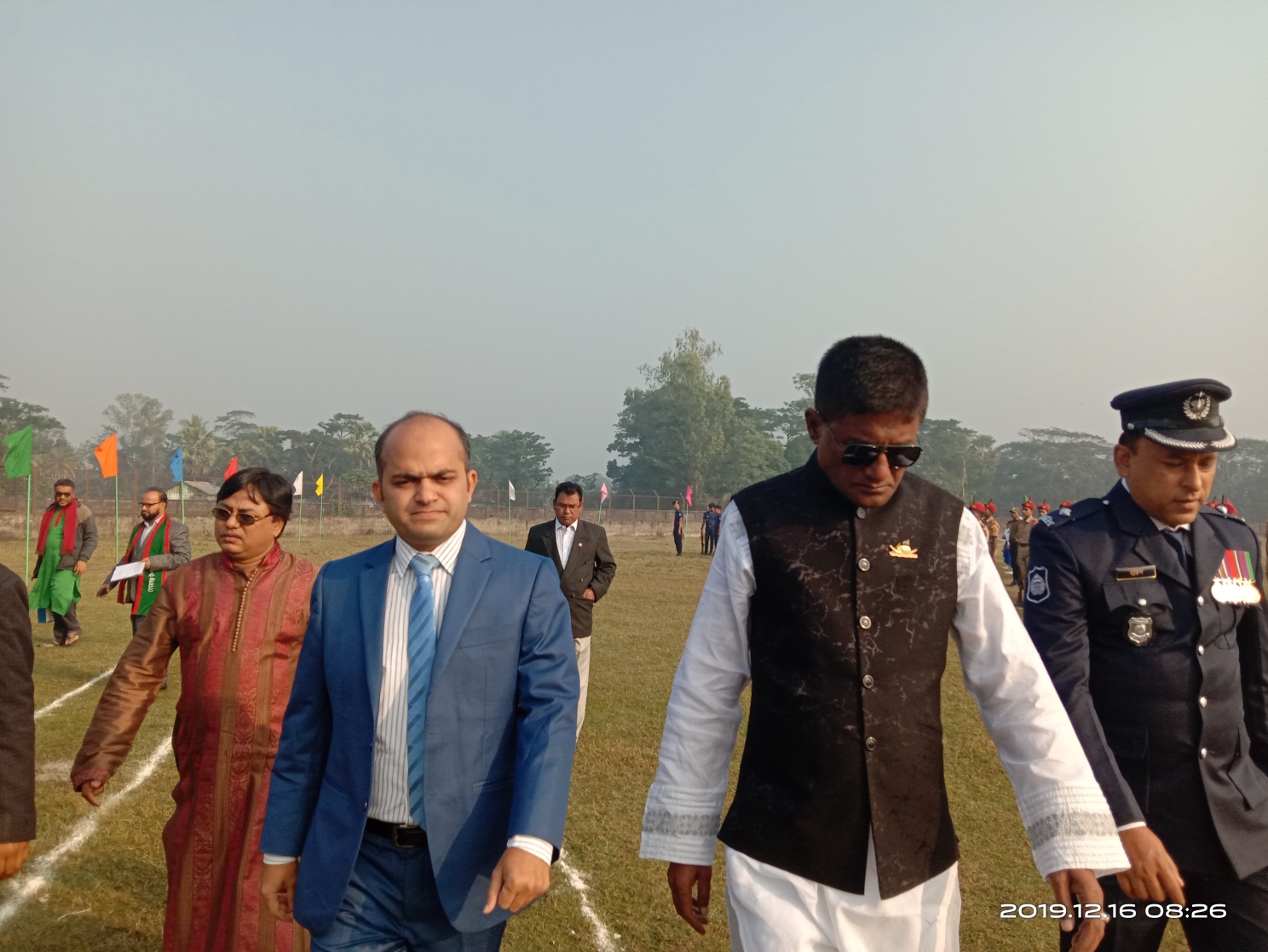 In the picture- Begumganj Upazilla Chairman Omar Faruk Badsha, Upazilla Nirbahi Officer, Officer-in-charge of Begumganj police station inspection marching on the occassion of Victory Day’ 2019. Chairman Gias Uddin Mithu is seen on the side.