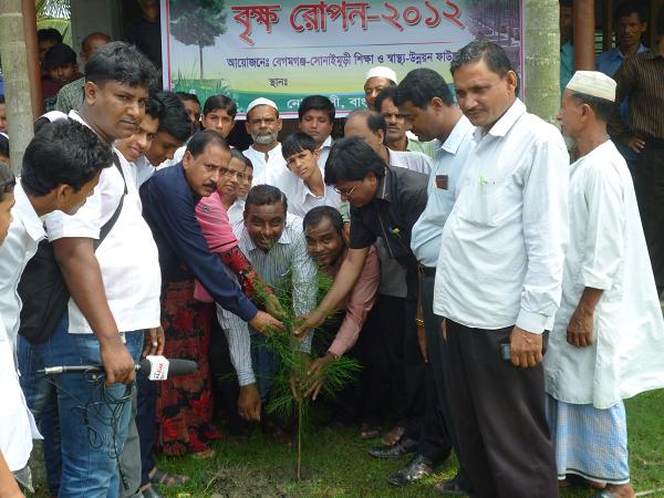In the Picture- To combat the adverse effects of climate change, Chairman of Begamganj-Sonaimuri Shikkha O Sastha Unnayan Foundation and Begumganj Technical and Computer Institute Principal Gias Uddin Mithu inaugurates tree planting. Char Clerk UP Chairman Md. Shahab Uddin and Ward Member Bokul Akter were present.