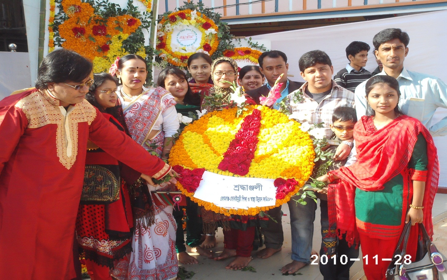 In the Pictrue- Chairman of Begamganj-Sonaimuri Shikkha O Sastha Unnayan Foundation and Begumganj Technical and Computer Institute Principal Gias Uddin Mithu offering flowers at the Central Shaheed Minar on the occasion of Victory Day.