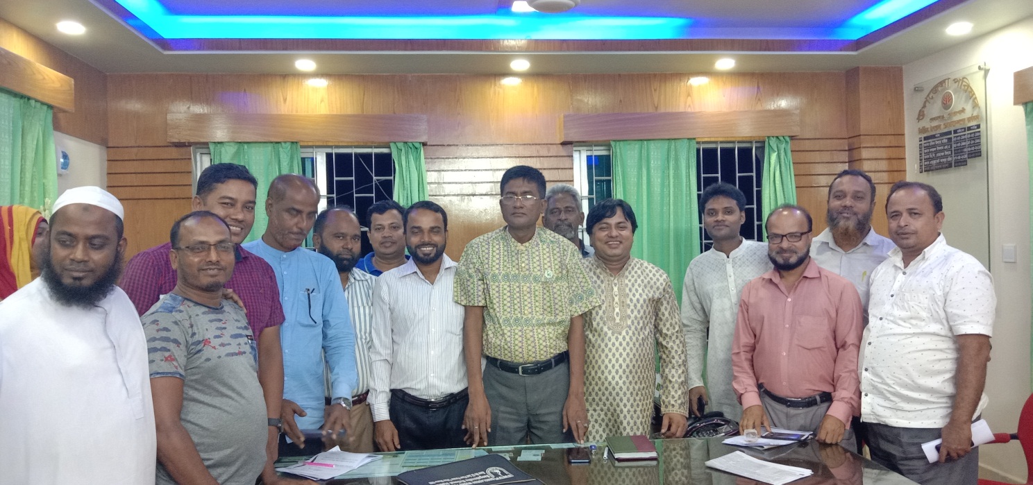 In the picture- Noakhali Usu Academy president upazila chairman Omar Faruk Badsha and other members of the newly elected committee along with foundation chairman Ghias Uddin Mithu.